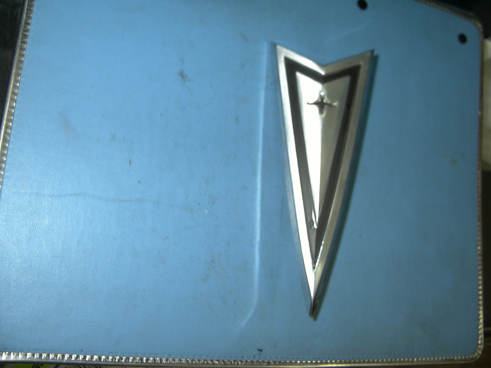 1965 Pontiac Radiator grille Emblem NOS # 9780104