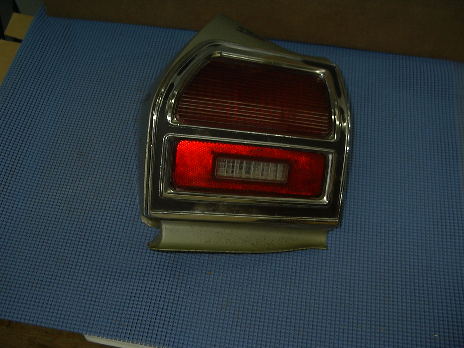 1969 Chevrolet Left Hand Tail Lamp Extension, Lens and Bezel Used # 8700943