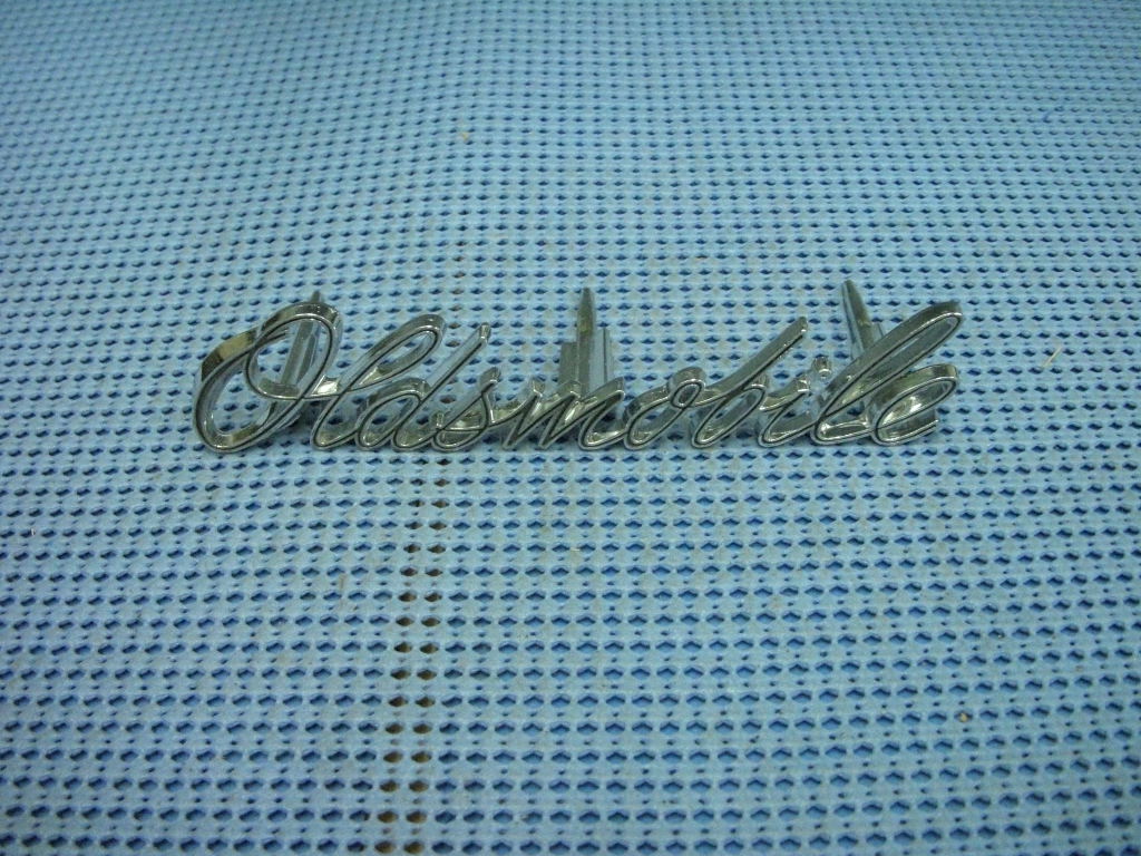 1968-1970 Oldsmobile Radiator Grille Script Package NOS # 230397