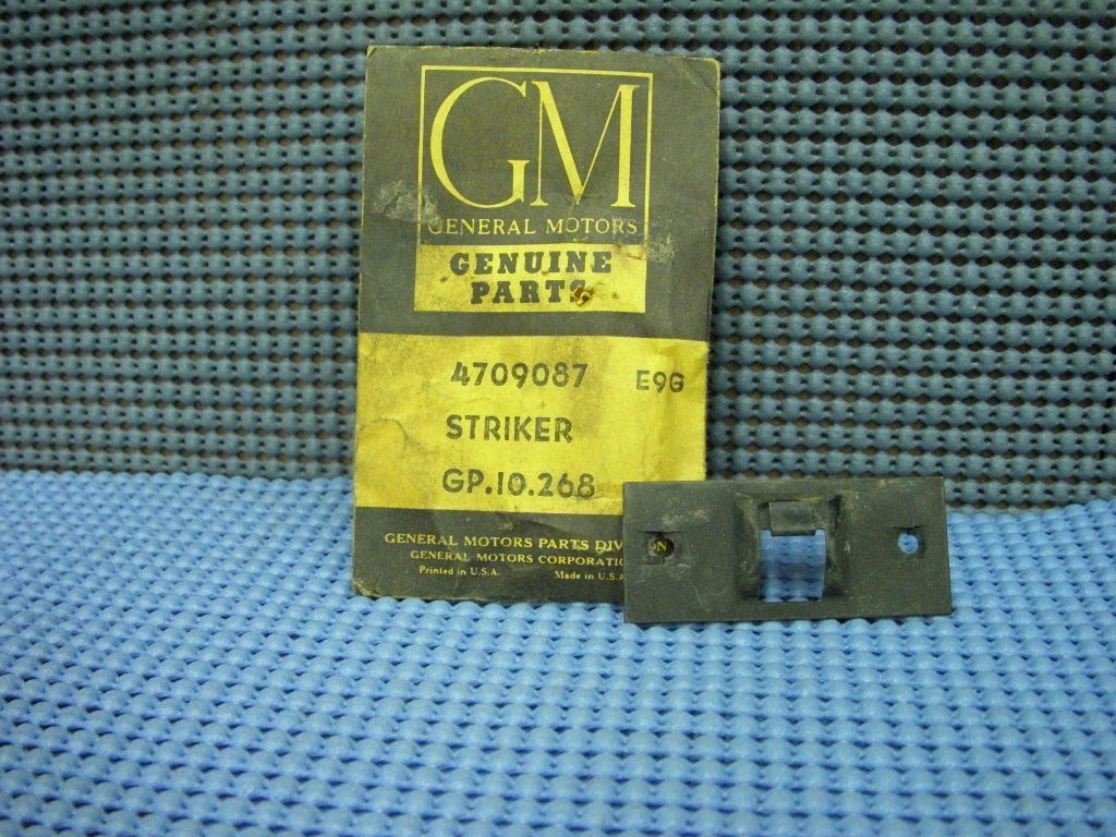 1957 - 1958 Oldsmobile Glove Compartment Door Lock Striker NOS # 4709087