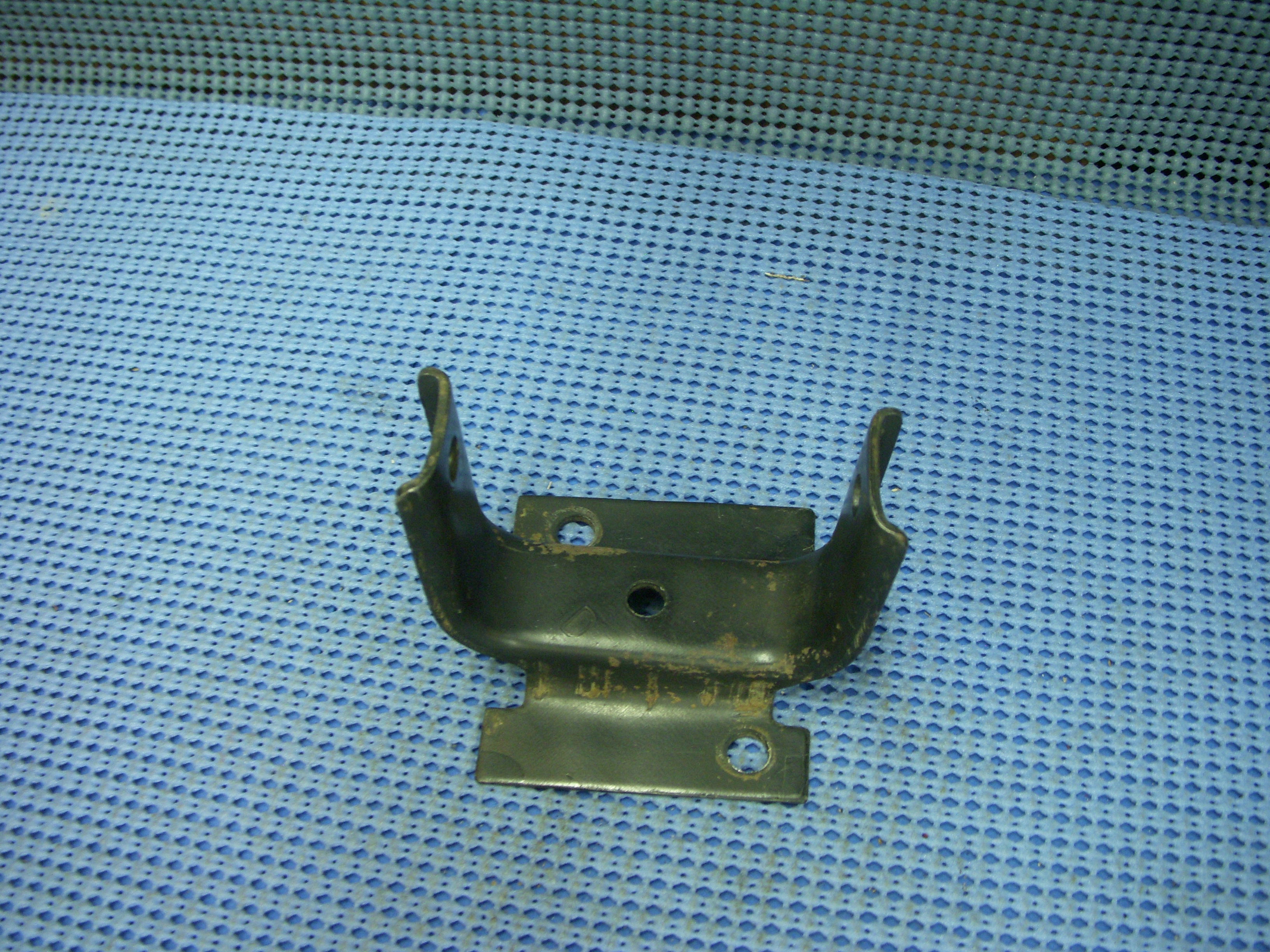 1963 - 1964 Oldsmobile Radiator Lower Support Bracket Assembly NOS # 586279